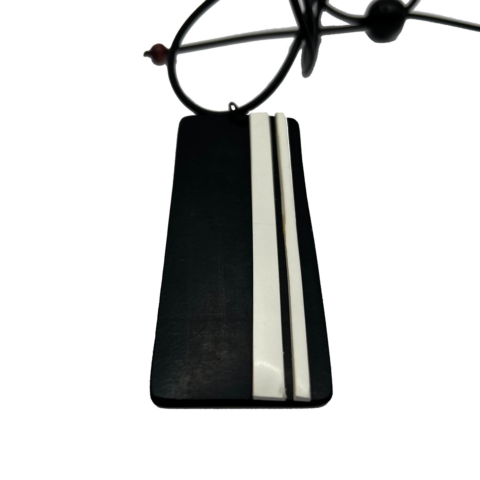 A black rectangular pendant with white GT stripes on an angle