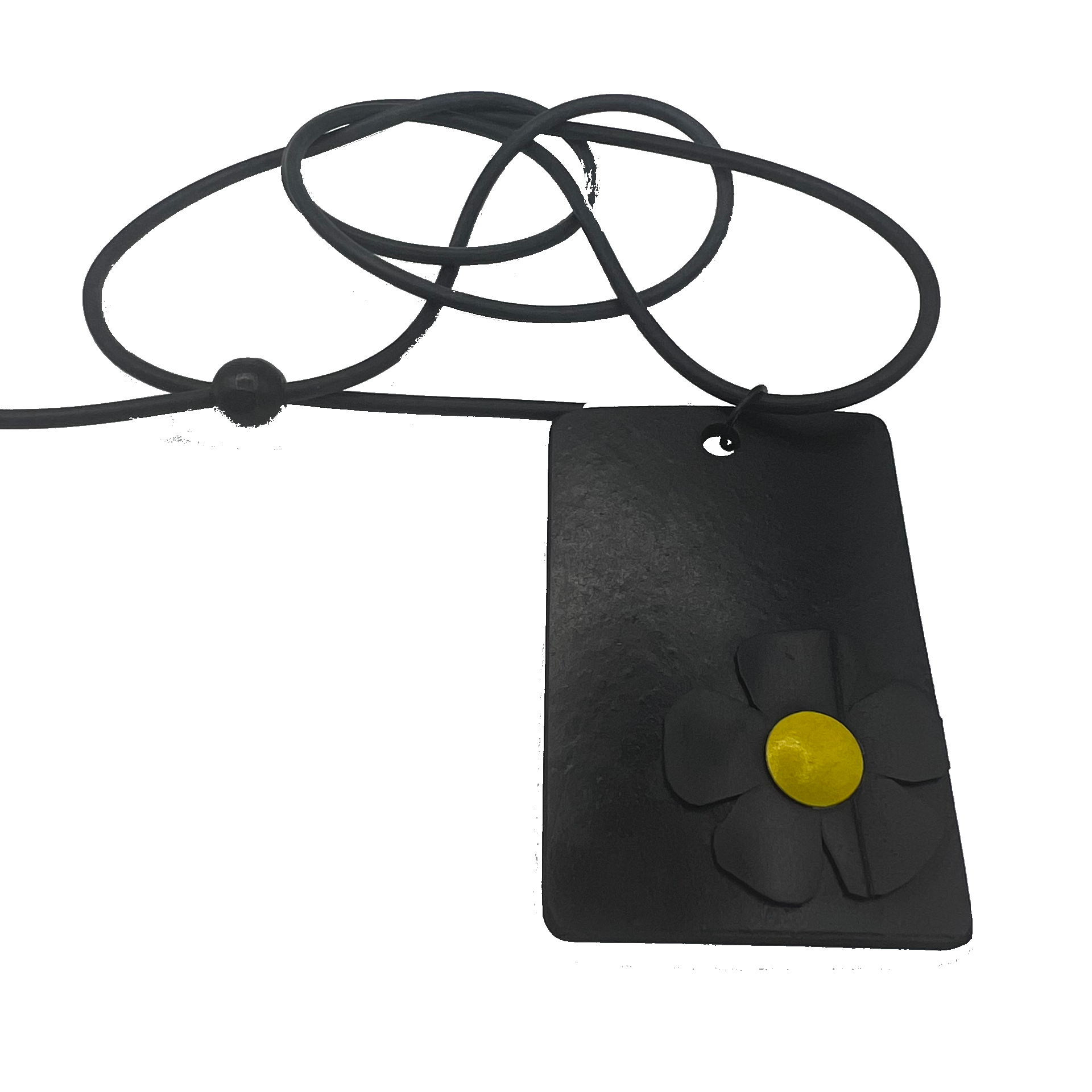 A black and yellow daisy on a rectangle black pendant